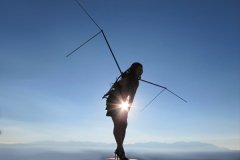 cosplay dragon wings shown in a beautiful model with a gorgeous sunset and solar flare