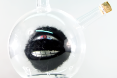 animatronic cosplay humonculus wireless controller robot with small black fur animatronic creature inside a glass flask for full metal alchemy costume creature contains five servos linkages a wireless link to two OLED remote control platforms