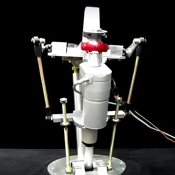 Industrial animatronic neck prototype—sturdy base, servo-driven tilt/rotation, wiring harness—Gen7 tech, white background