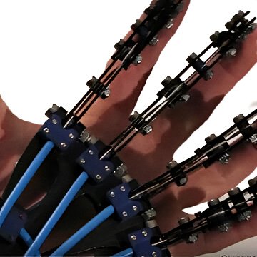 Custom robotic hand prototype in foreground—detailed fingers and joints—compared to human hand behind for scale, engineering demo