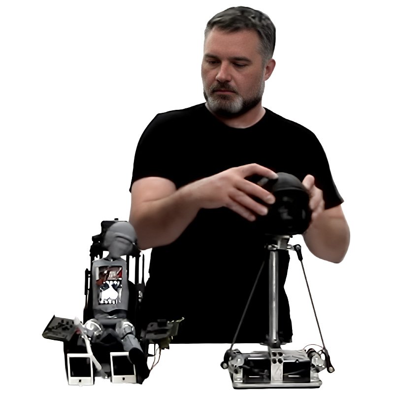 Custom Entertainment Solutions puppeteer using Waldo remote control system to operate full-size animatronic robot