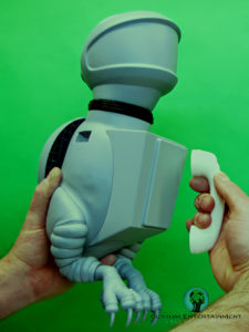 FDM and SLA 3D printed animatronic figure in gray primer with white SLA printed telephone, ready for molding.